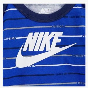 Blue striped Nike onesie